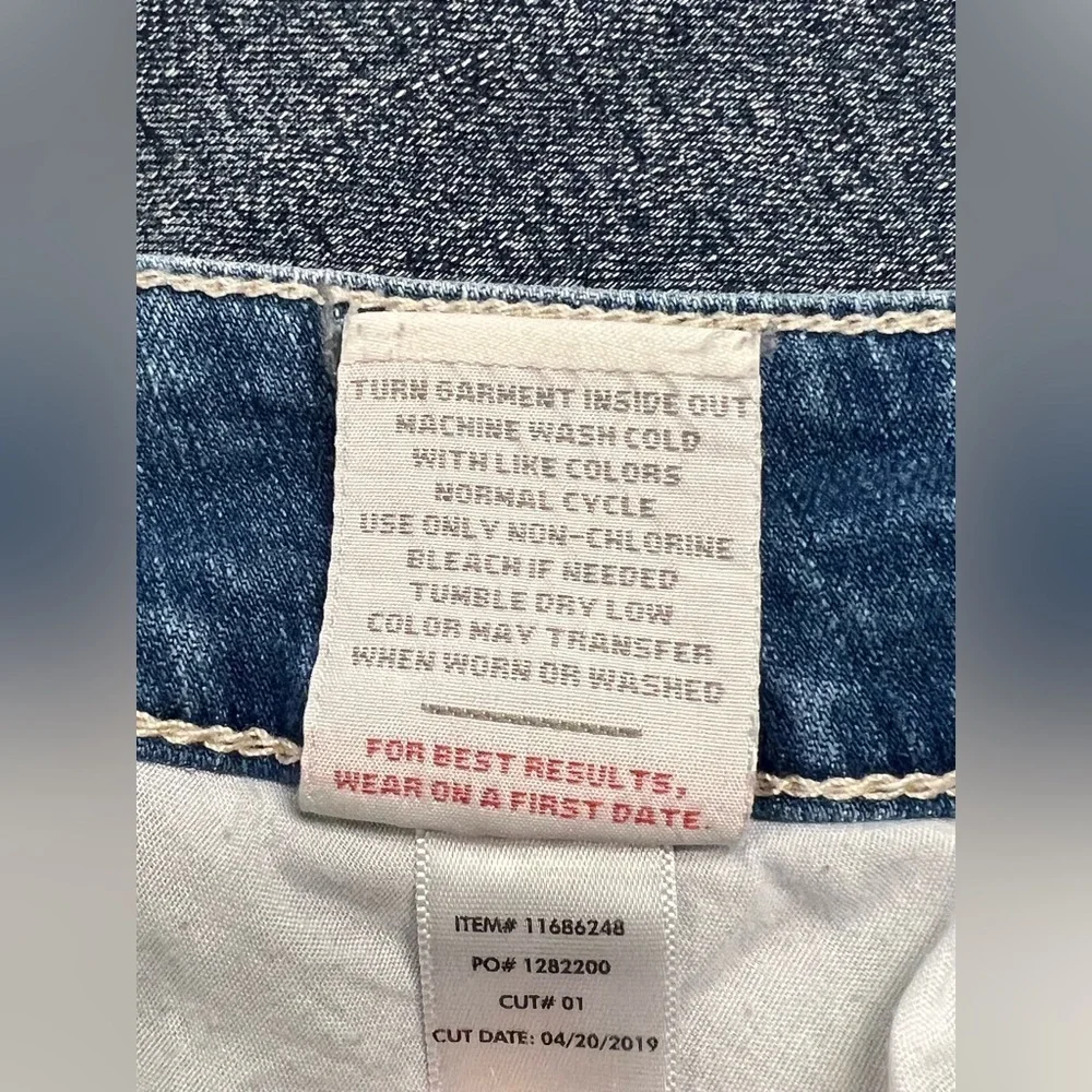 Light Wash Distressed Bermuda Shorts